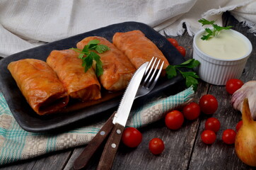 Cabbage rolls stuffed with ground meat and rice. Delicious homemade stuffed cabbage leaves with meat, rice and spices