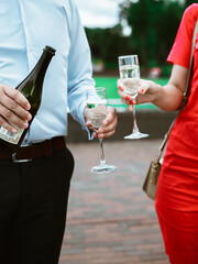 person with a glass of champagne