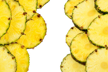 Pineapple juicy yellow slices background. Top view.