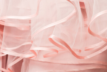 Wedding dress detail. Pink wedding dress frills close up.