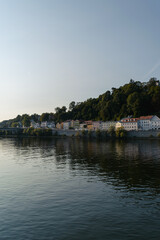 Fototapeta na wymiar Houses' reflection on the Danube River in summer, Passau, Germany
