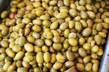 Stall with Tsakistes olives at street market in Athens, Greece.