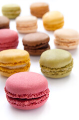 Colorful French Macarons on the white background