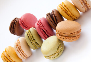 Colorful French Macarons on the white background