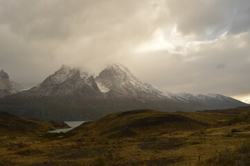 Fototapeta premium Hiking around the dramatic and windy mountain landscapes of Torres del Paine in Patagonia, Chile