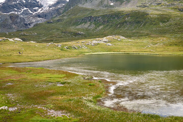 Fototapeta na wymiar View of Lago Nero from Bernina pass
