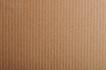 Fototapeta premium Vertical lines on brown paper background