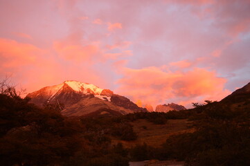 Hiking around the dramatic and windswept mountain landscapes of the Torres del Paine National Park in Patagonia, Chile