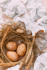 Fototapeta na wymiar Brown eggs in the nest