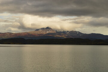Hiking around the dramatic and windswept mountain landscapes of the Torres del Paine National Park in Patagonia, Chile