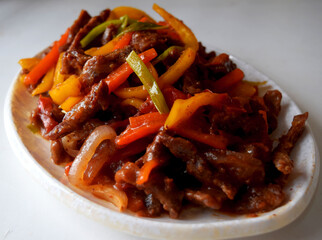 Beef and vegetables. stew with vegetables. Closeup view beef stir fry.