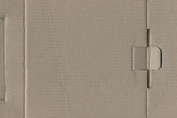 Close up of a light brown vintage rough sheet of carton. Cardboard paper texture with a blank background. Empty papercraft surface. Recycled environmentally friendly material.