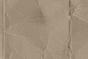 Close up of a light brown vintage rough sheet of carton. Cardboard paper texture with a blank background. Empty papercraft surface. Recycled environmentally friendly material.