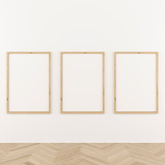 Three vertical wooden frame poster on white wall with wooden parquet. 3 frame mock up. 3D illustration.