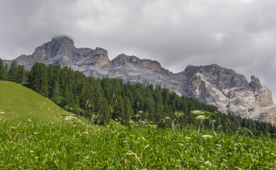 Obraz premium La Varella mountain, Fanes-Senes-Braies mountain par, as seen from above San Casiano village, Alta Badia, Dolomites, South Tirol, Italy.