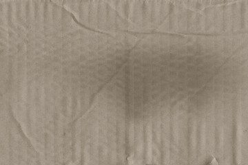 Close up of a light brown vintage rough sheet of carton. Cardboard paper texture with a blank background. Empty papercraft surface. Recycled environmentally friendly material.