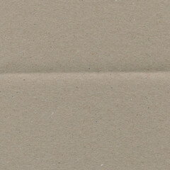 Close up of a light brown vintage rough sheet of carton. Cardboard paper texture with a blank background. Empty papercraft surface. Recycled environmentally friendly material.