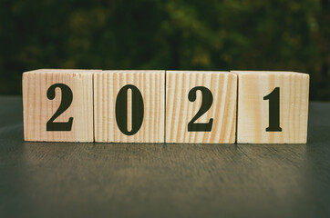 Wooden cube with numbers 2021 The beginning of the new year