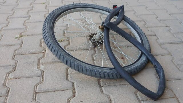 make bicycle tire repair, a person is repairing a puncture bicycle inner tubes,