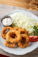deep fried squid rings with cabbage