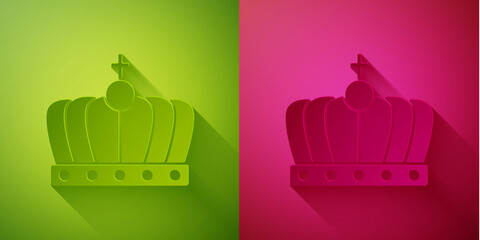 Paper cut King crown icon isolated on green and pink background. Paper art style. Vector.