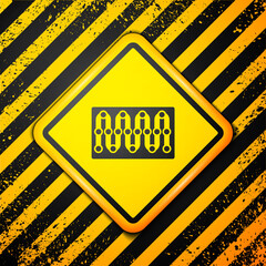 Black Board game icon isolated on yellow background. Warning sign. Vector.