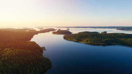 A calm evening landscape with lake and islands. Dramatic and picturesque scene. Popular tourist attraction. Exploration travel world