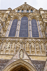 Obraz premium Medieval spire of Salisbury cathedral in the close Salisbury, Wiltshire, England, United Kingdom