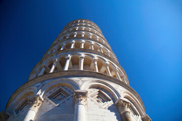 Closeup of Leaning Tower of Pisa, bell tower of the Cathedral (Duomo di Santa Maria Assunta) in...