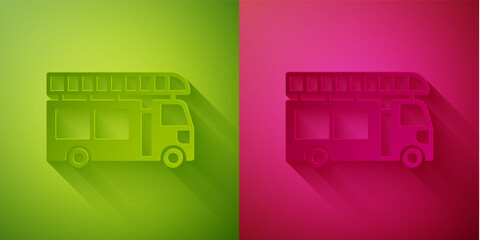 Paper cut Fire truck icon isolated on green and pink background. Fire engine. Firefighters emergency vehicle. Paper art style. Vector.