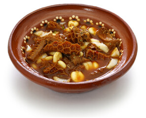 Menudo Rojo is a traditional mexican soup made with honeycomb tripe and hominy in broth with chile guajillo base. 
