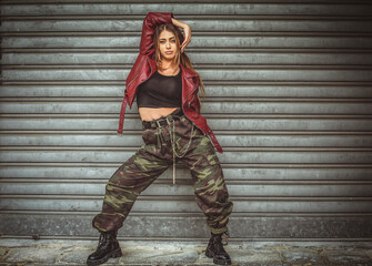 Young woman hip-hop dance movements.