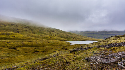 Fototapeta na wymiar Rugged landscape in Faroe Islands