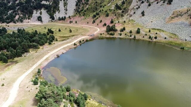 Aerial view of Neila lagoons park, in Burgos, Demanda mountain range, Castilla y Leon, Spain. High quality 4k footage