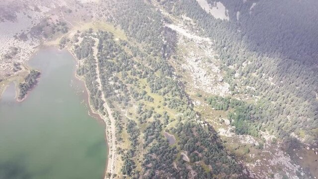 Aerial view of Neila lagoons park, in Burgos, Demanda mountain range, Castilla y Leon, Spain. High quality 4k footage