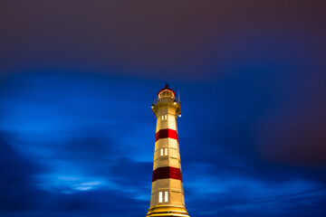 Lighthouse on a dark and stormy night. 