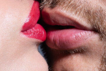 Sexy kiss with red lips. Close-up of beautiful passionate sexy couple kissing.