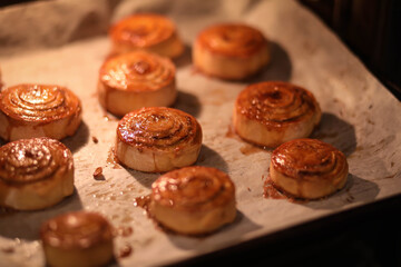 hot cinnamon rolls in the oven