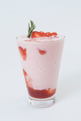 Strawberry smoothie or milkshake on white background