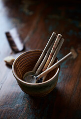 Traditional, handcrafted ceramic. Rustic wooden background. Close up. 