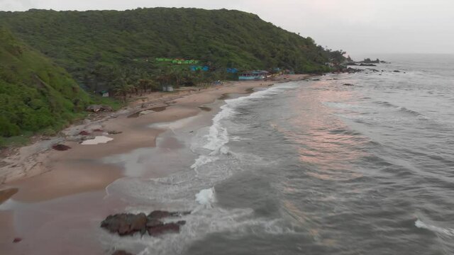 Aerial Fly over Beach of Goa | Indian Coastline Shore on a Cloudy Day