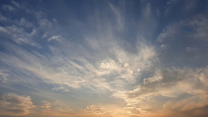 Naklejka na ściany i meble the autumn sky with clouds of sunset