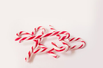 new year and Christmas sweetness candy canes on white background