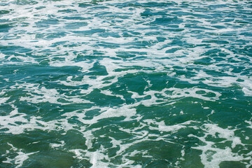 Aegean Sea by day in storm, resort, foam, off season, horizontal