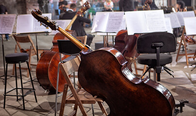 the musical instruments of the symphony orchestra rest before the concert.