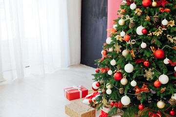 Christmas tree pine decor red background New Year holiday gifts