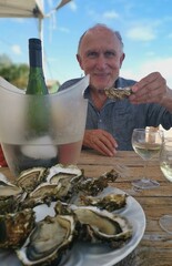 person holding a bowl of seafood