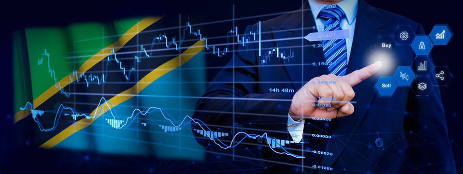 Businessman touching data analytics process system with KPI financial charts, dashboard of stock and marketing on virtual interface. With Tanzania flag in background.