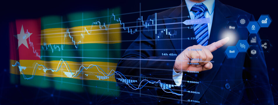 Businessman touching data analytics process system with KPI financial charts, dashboard of stock and marketing on virtual interface. With Togo flag in background.