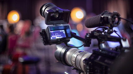 Film industry. detail of Video camera. Broadcasting and Recording with Digital Camera - 384437059